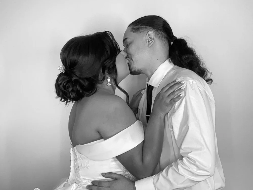 Wedding couple photo booth moment