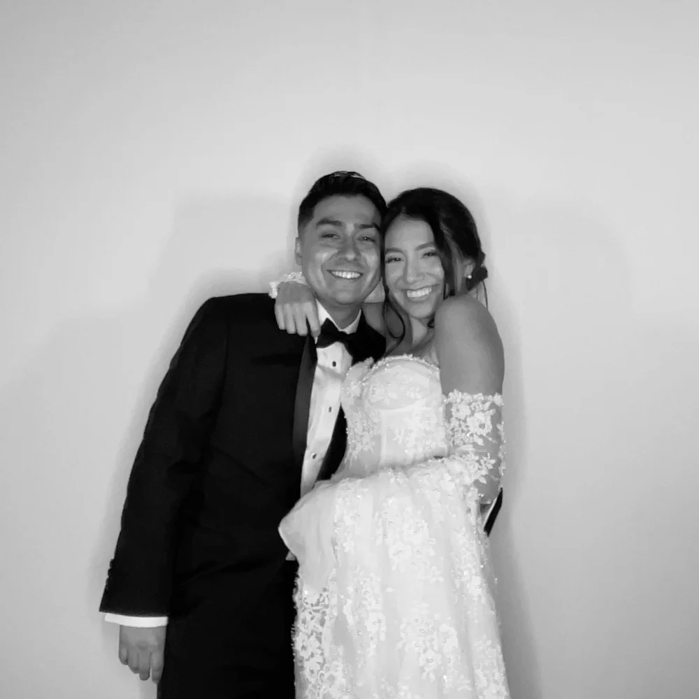 Couple in the OllyPix photo booth at a Park Cities wedding