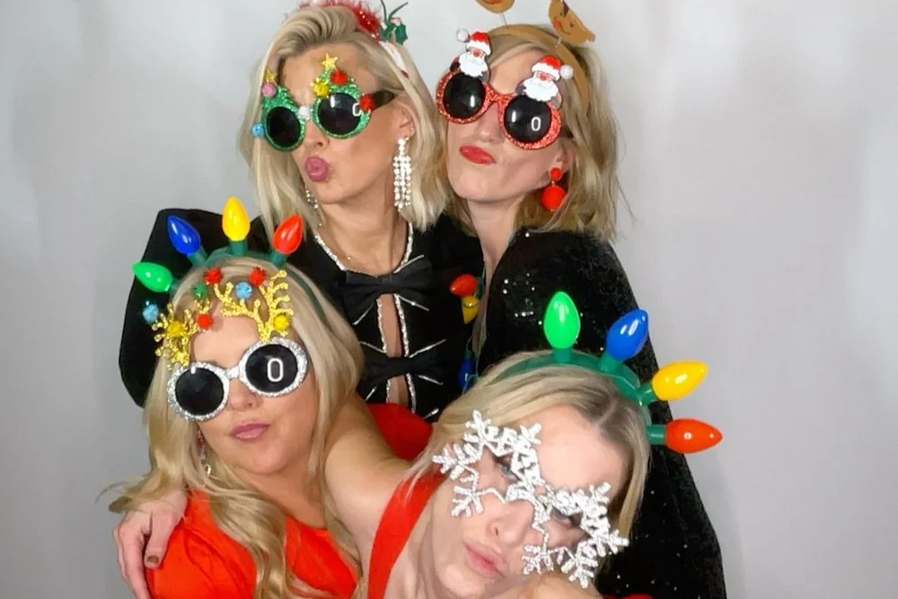Group of guests posing together in the OllyPix photo booth